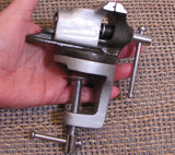 Bench vice, for Small work,  2 inch wide jaw, opens to 1 1/2 inch, swivel head, up to 1 1/2 inches - Romazone