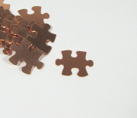 Copper Puzzle Blank,  puzzle piece, 22 gauge copper,  20mm x 16mm, 15 pack, autism stamp symbol,  for stamping, puzzle shape, for stamping, - Romazone